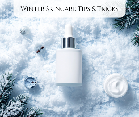 Unlabeled skincare products sitting in snow with the title "Winter Skincare Tips & Tricks"
